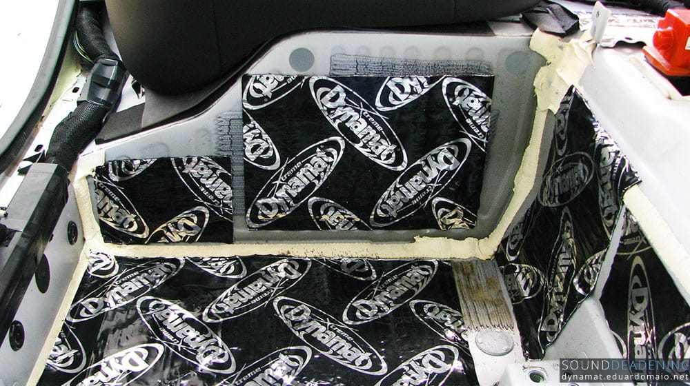 Panel under the rear seats